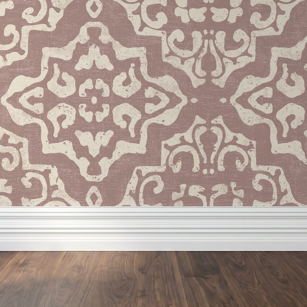 Antique damask rosewood wallpaper with cream motifs in a classic setting.