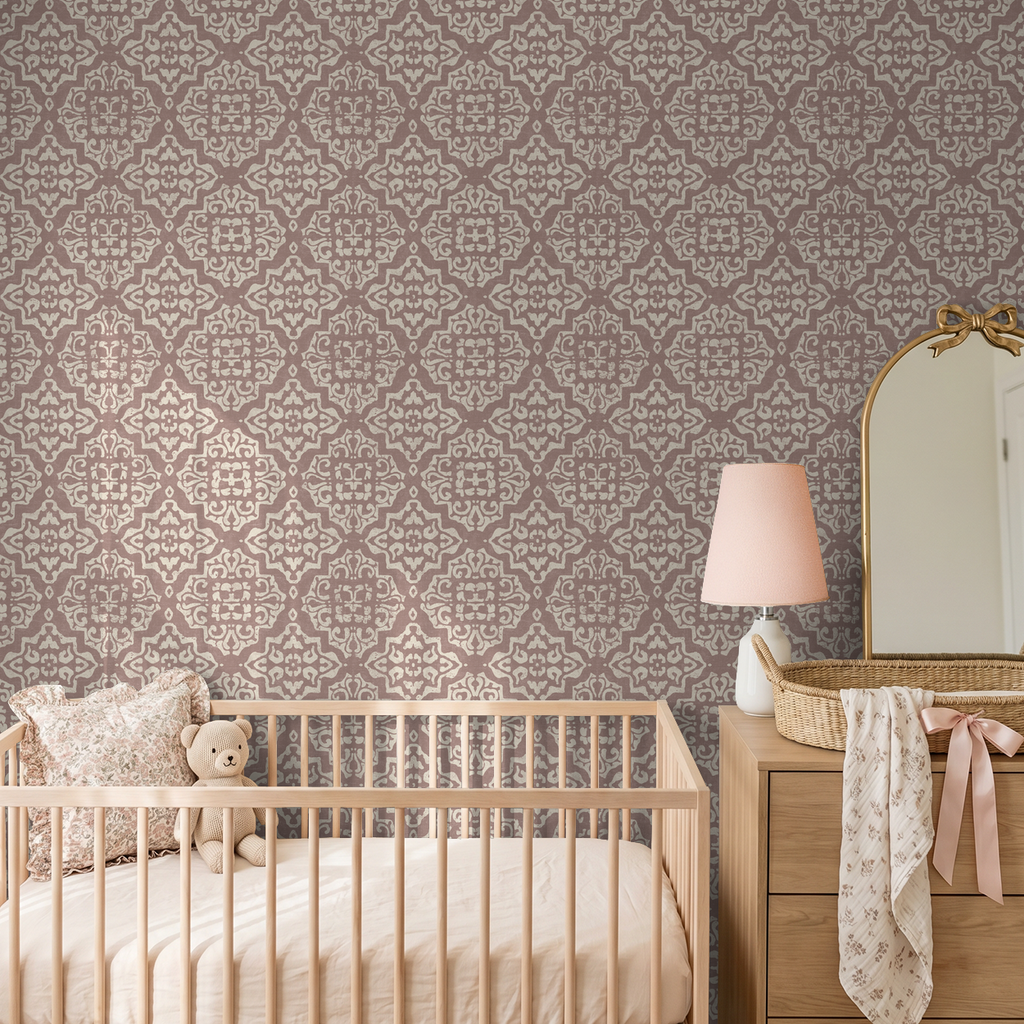 Antique damask rosewood wallpaper in nursery with crib and dresser.