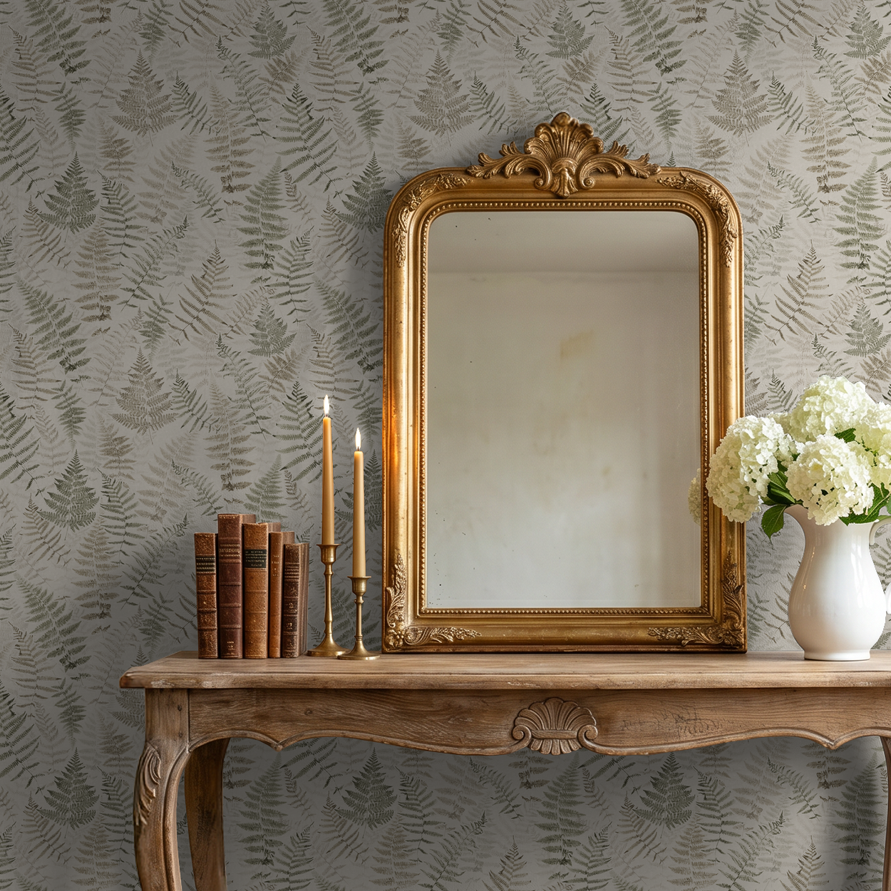 Botanical fern wallpaper in cream and walnut with antique mirror and wooden table.