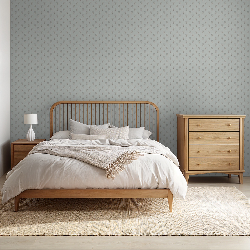 Botanical wallpaper with delicate floral motifs in a serene bedroom setting.