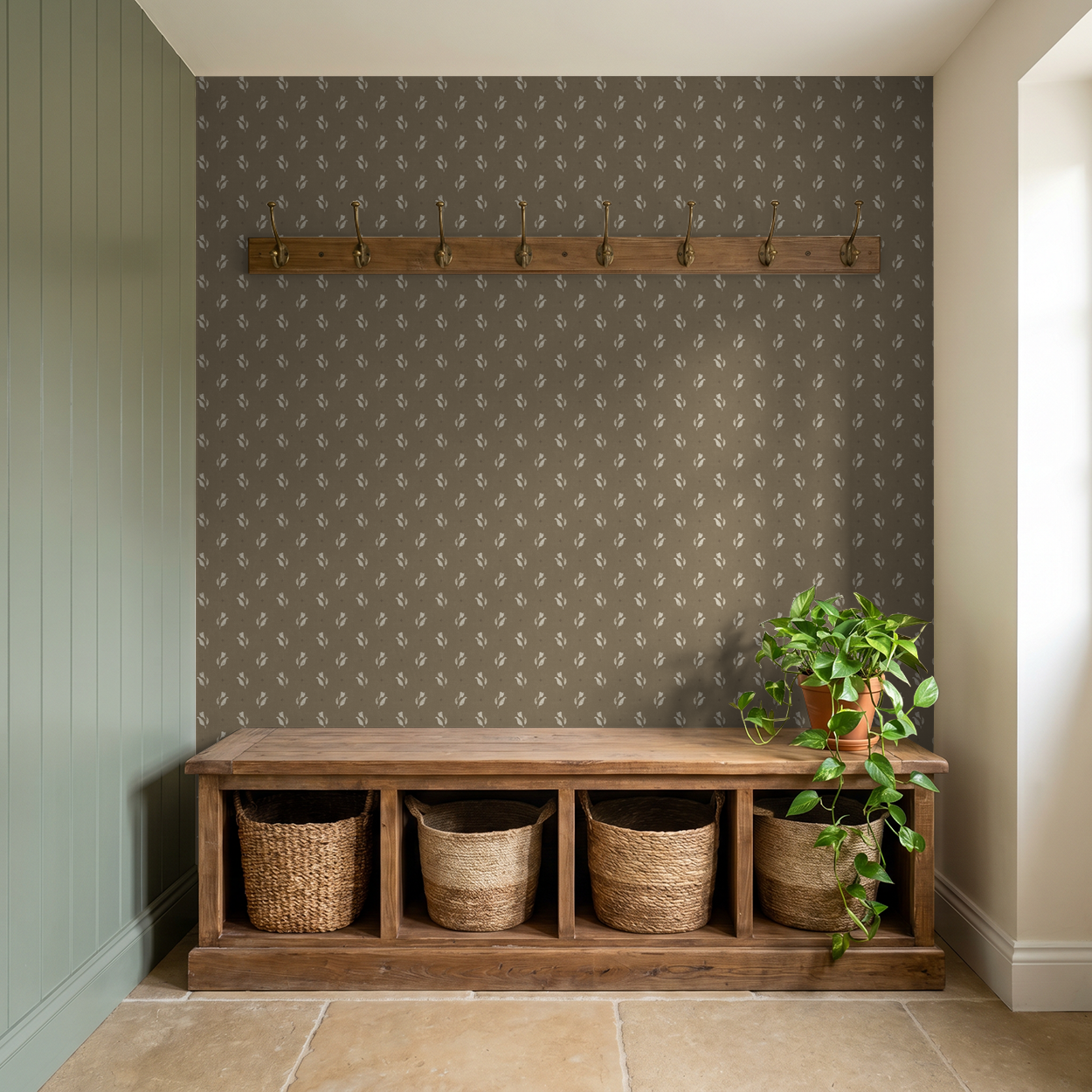 Botanical floral wallpaper in brown with ivory motifs in rustic entryway setting.