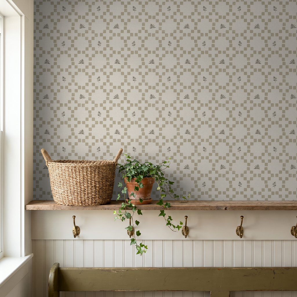 Botanical lattice taupe wallpaper with leaf motifs in rustic room setting.