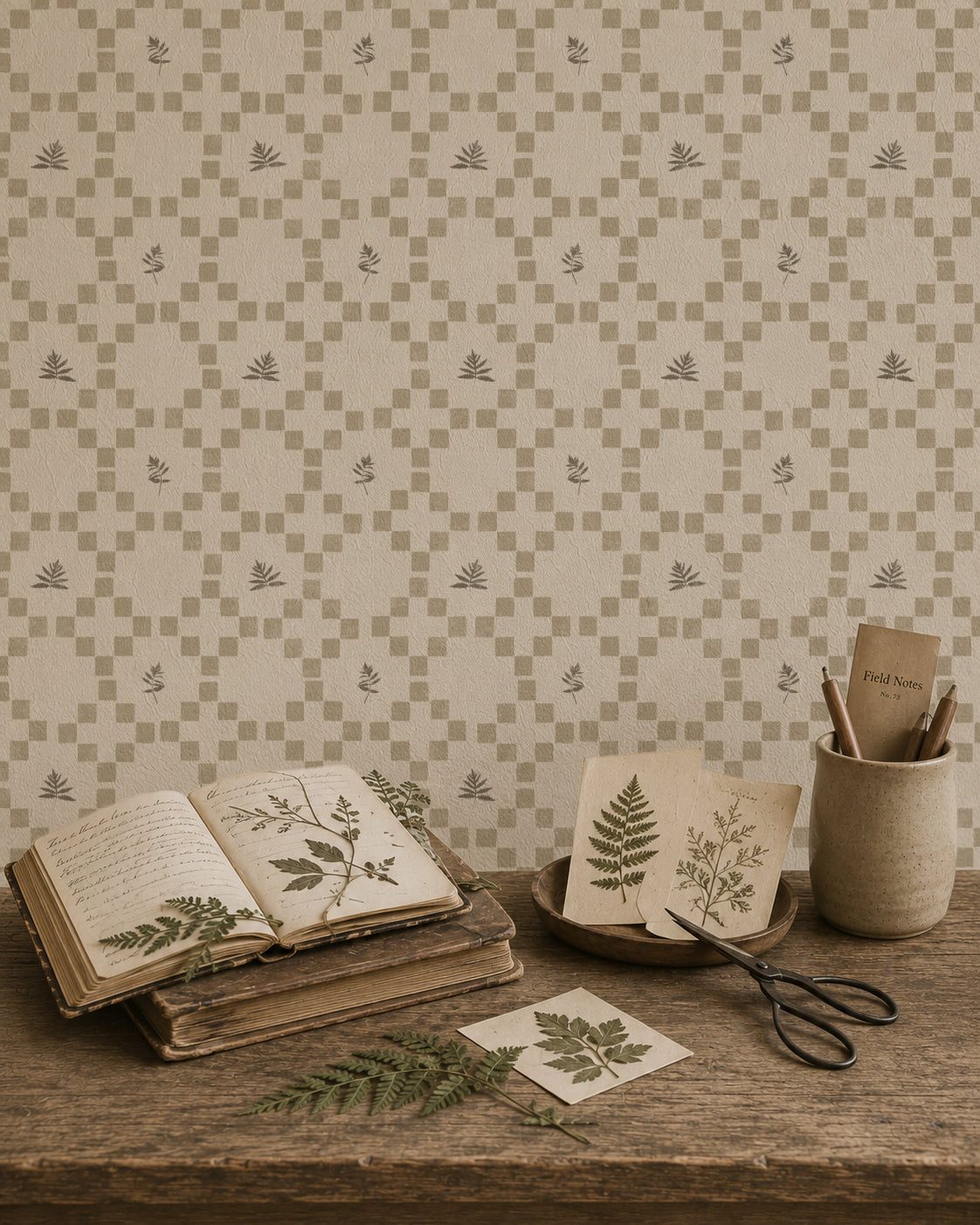 Botanical lattice taupe wallpaper with leafy motifs in a rustic setting.