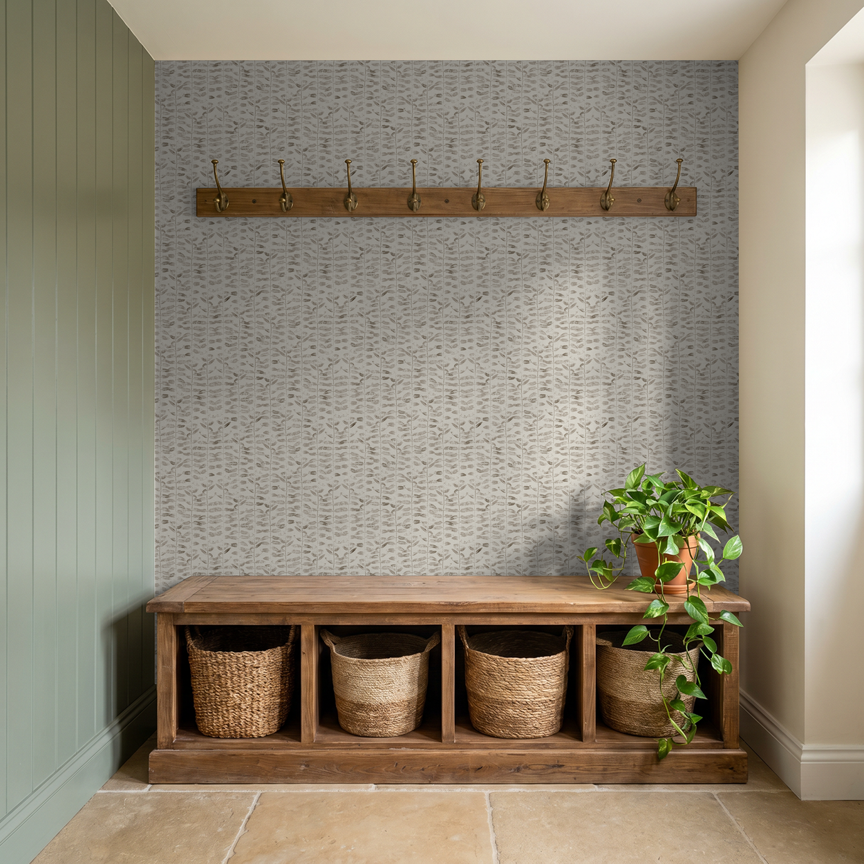 Botanical taupe wallpaper in rustic entryway with wooden bench and plant
