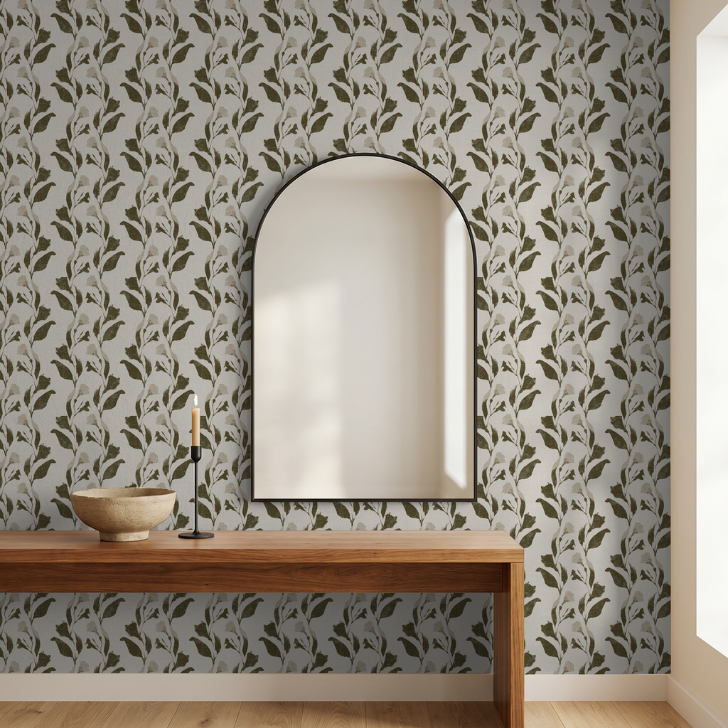 Botanical vine olive on cream wallpaper in modern room with wooden console and mirror.