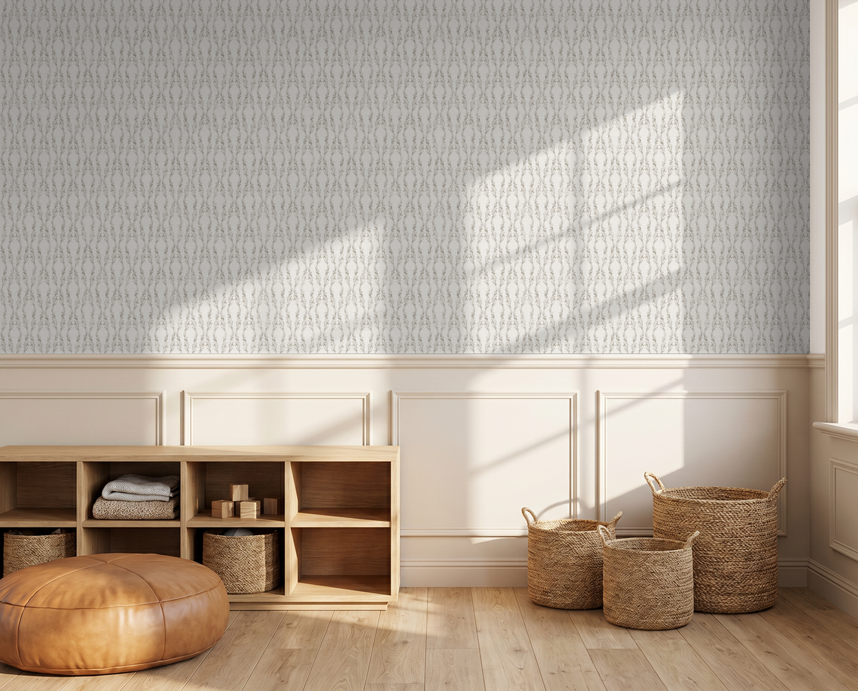 Elegant botanical wallpaper in muted grays in a sunlit room with wicker baskets and wood accents.