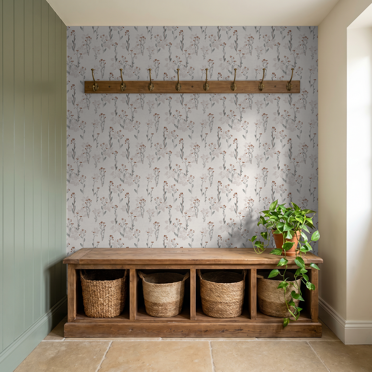 Bramble Wildflower floral wallpaper in rustic entryway with wooden bench and plants.