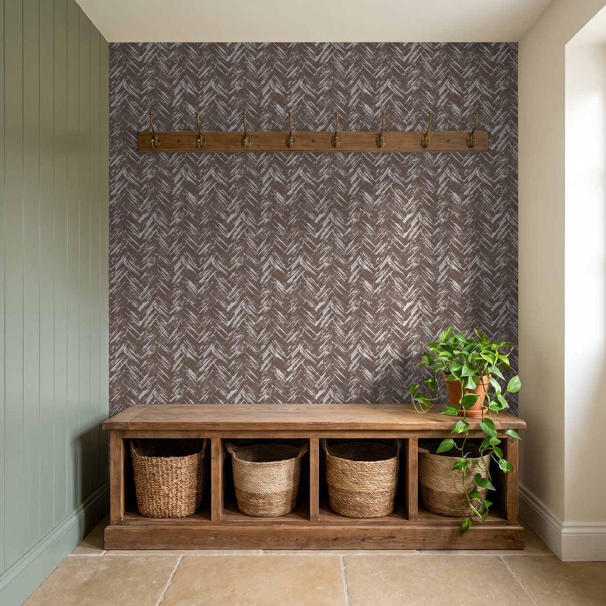 Brown chevron herringbone wallpaper in rustic entryway with wooden bench and plant.