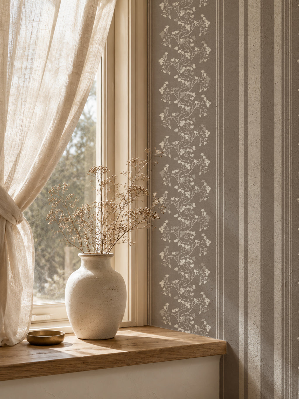 Brown floral stripe wallpaper in cozy room with vase and curtain