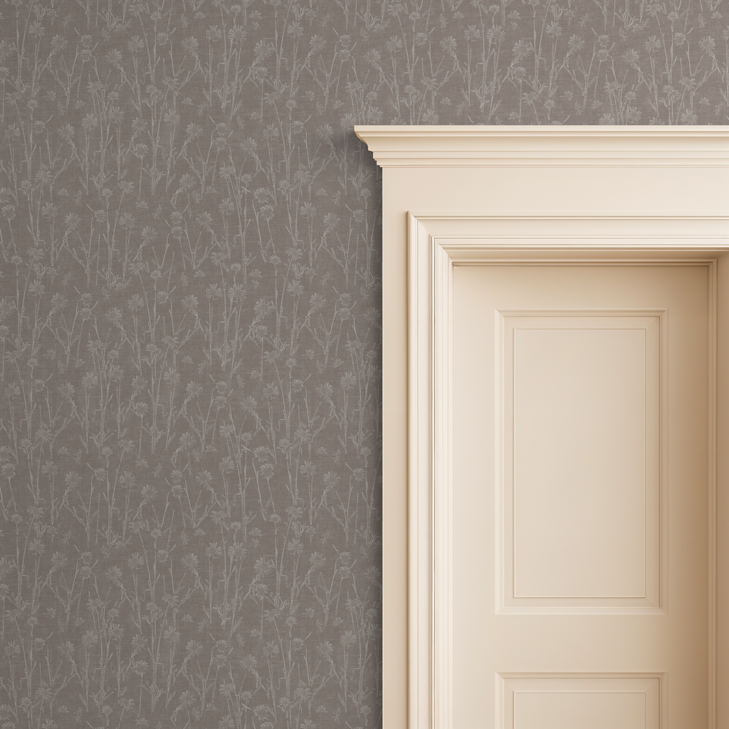 Brown floral wallpaper with delicate wildflower pattern next to a cream doorframe.