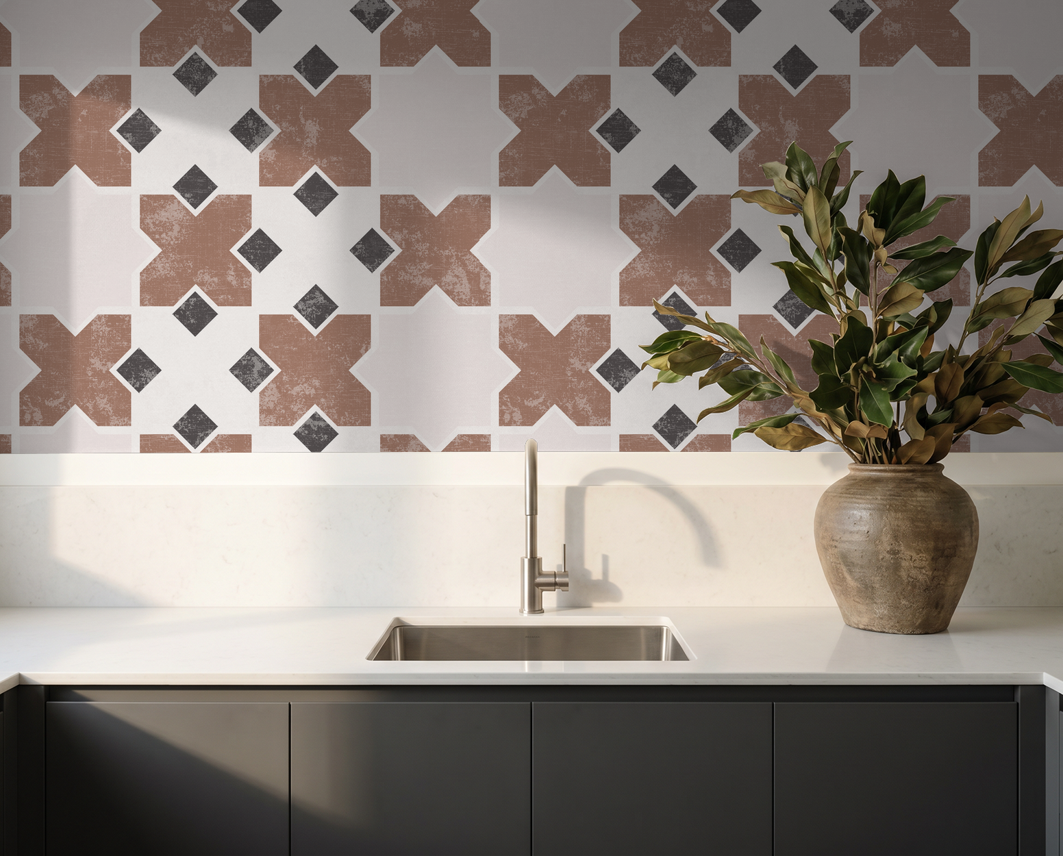 Burnt orange geometric tile wallpaper in modern kitchen with vase.
