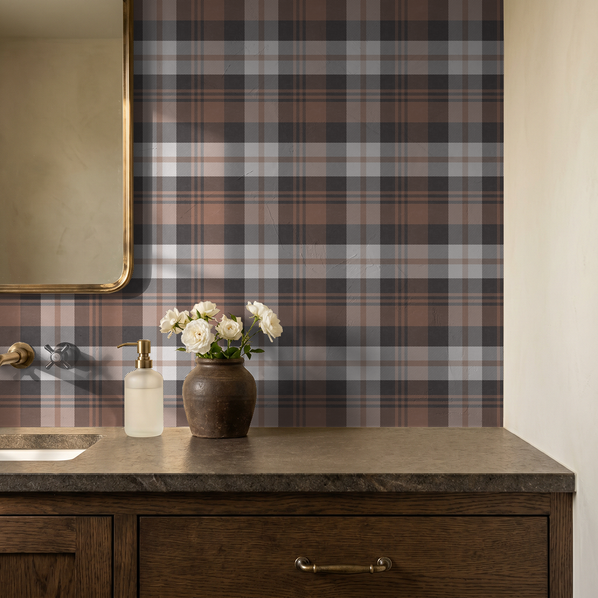 Burnt orange plaid wallpaper in bathroom with wooden vanity and flowers.