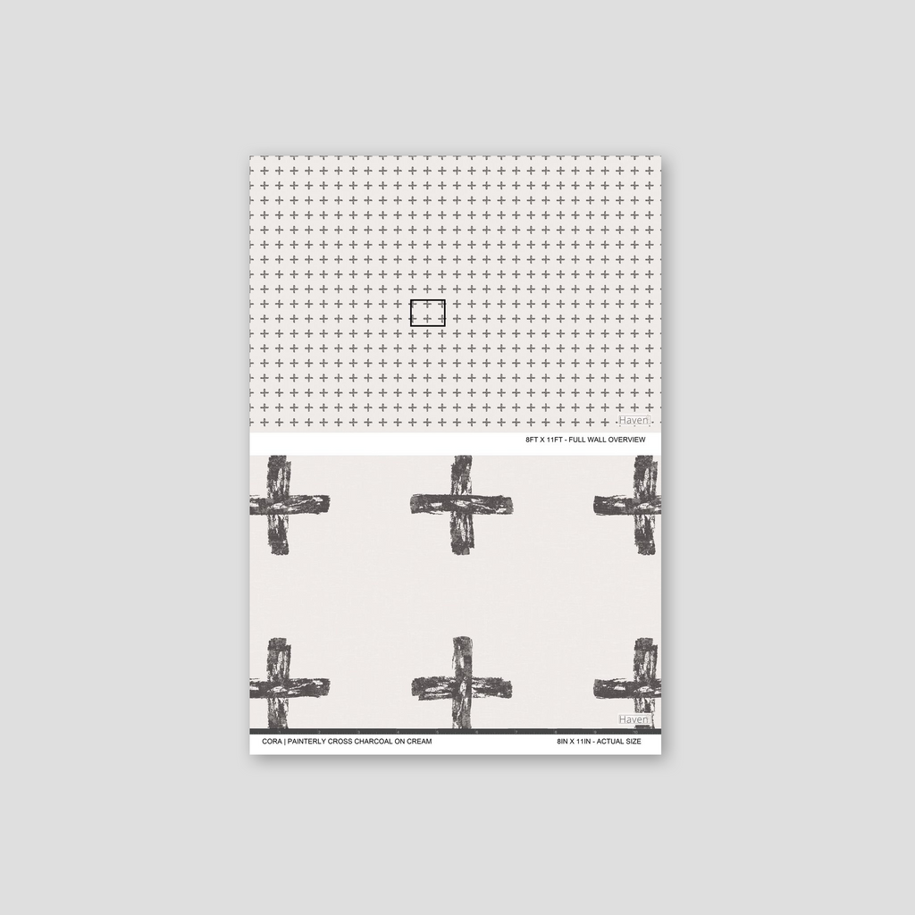 Charcoal cross motifs on cream wallpaper with painterly texture.