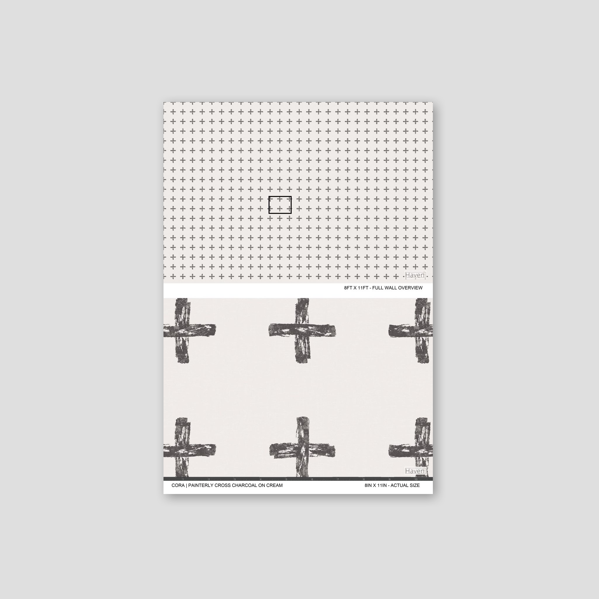 Charcoal cross motifs on cream wallpaper with painterly texture.