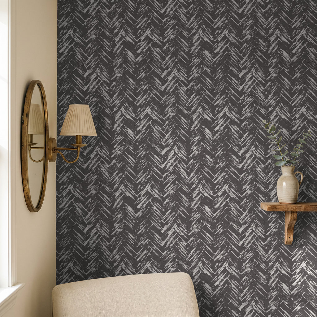 Chevron herringbone charcoal wallpaper in modern living room with mirror and shelf decor.