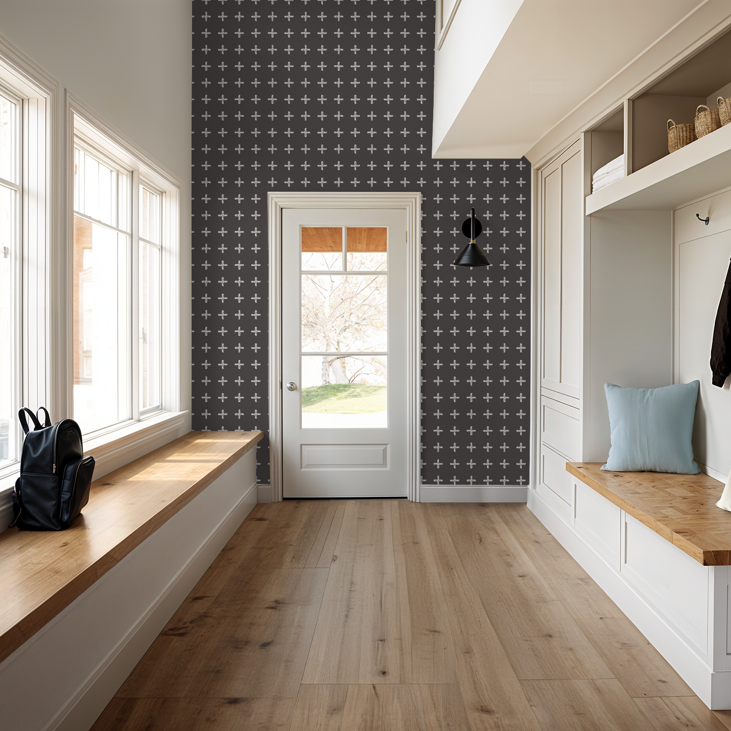 Modern hallway with cream cross pattern wallpaper on charcoal background.