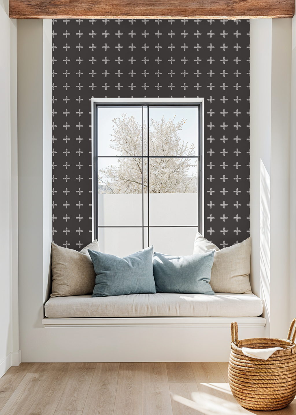 Modern window nook with cream cross pattern on charcoal wallpaper.