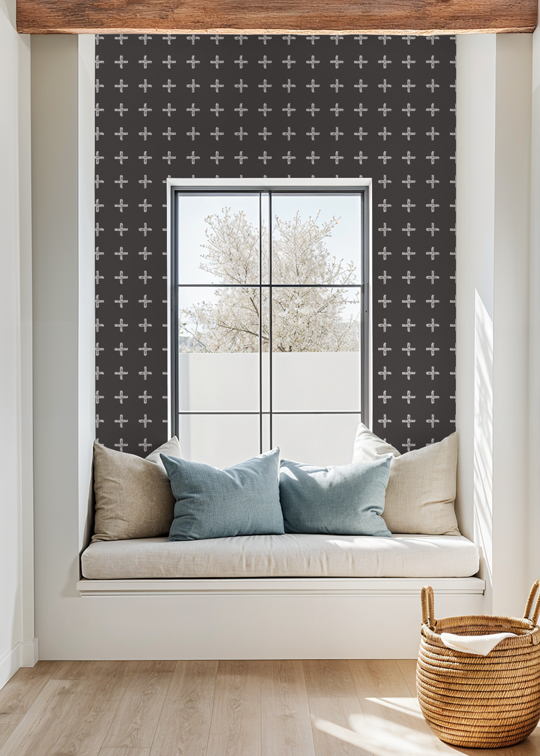 Modern window nook with cream cross pattern on charcoal wallpaper.