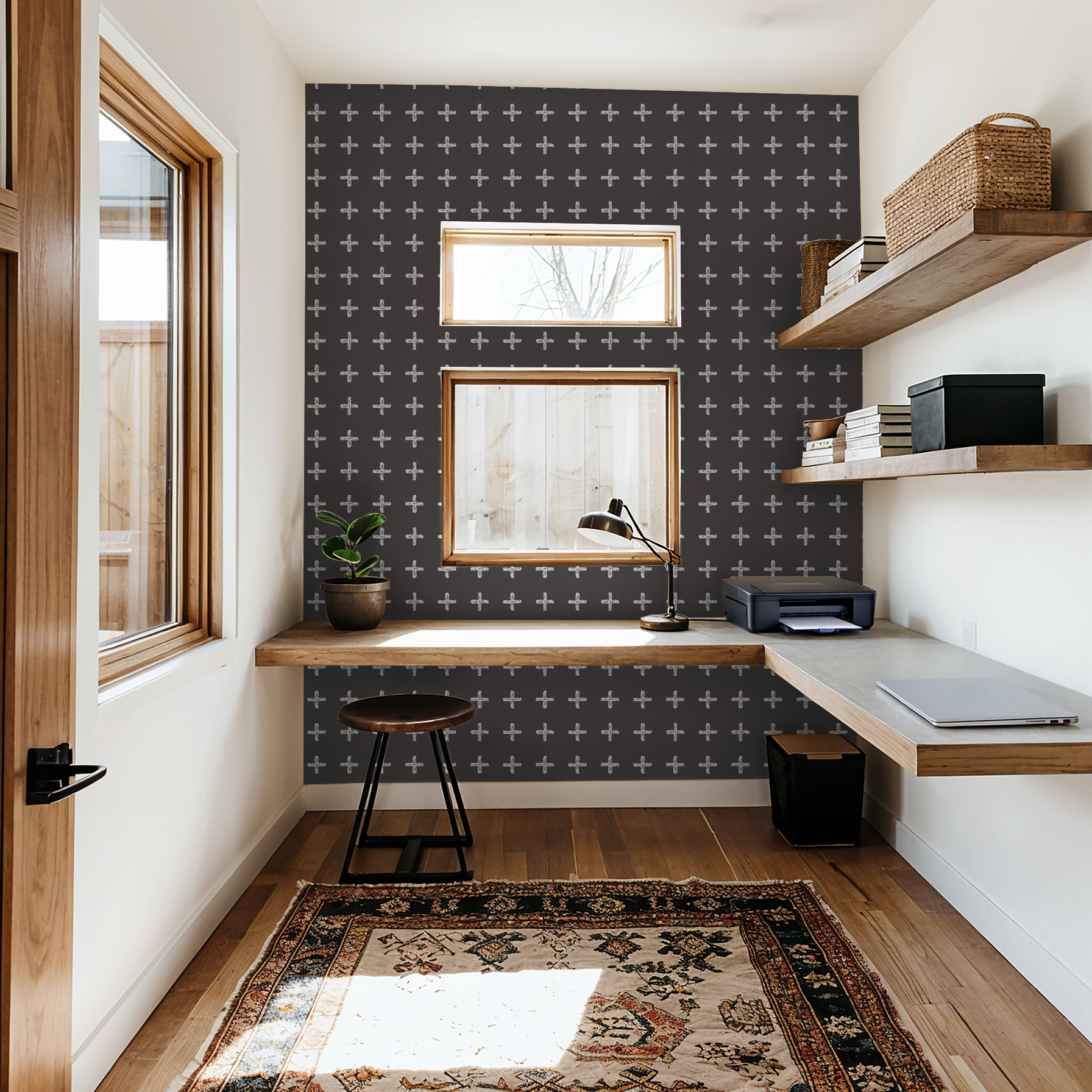 Modern home office with cream cross pattern wallpaper on charcoal wall.