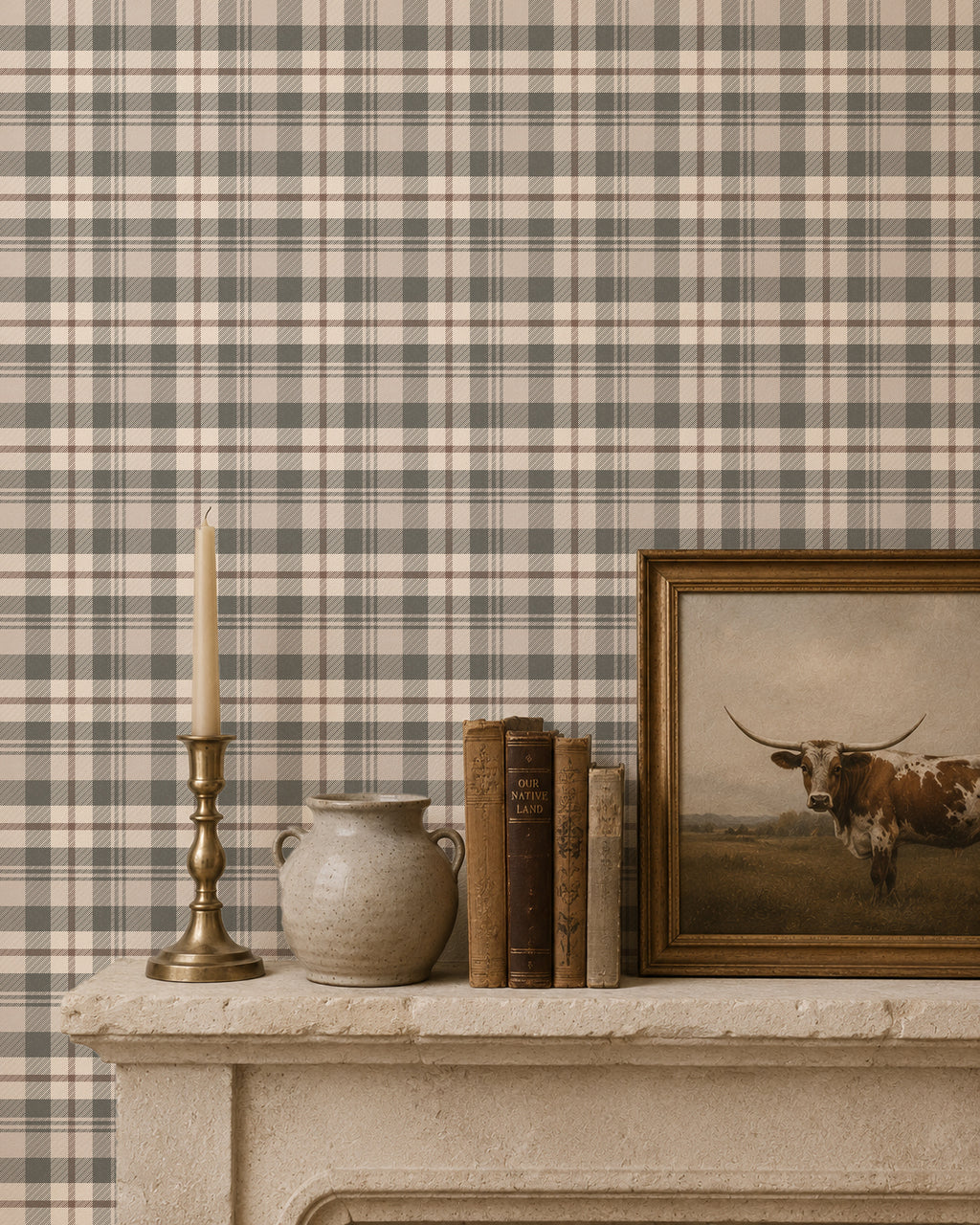 Cream and green plaid wallpaper in a rustic room with books and a candle on a mantel.