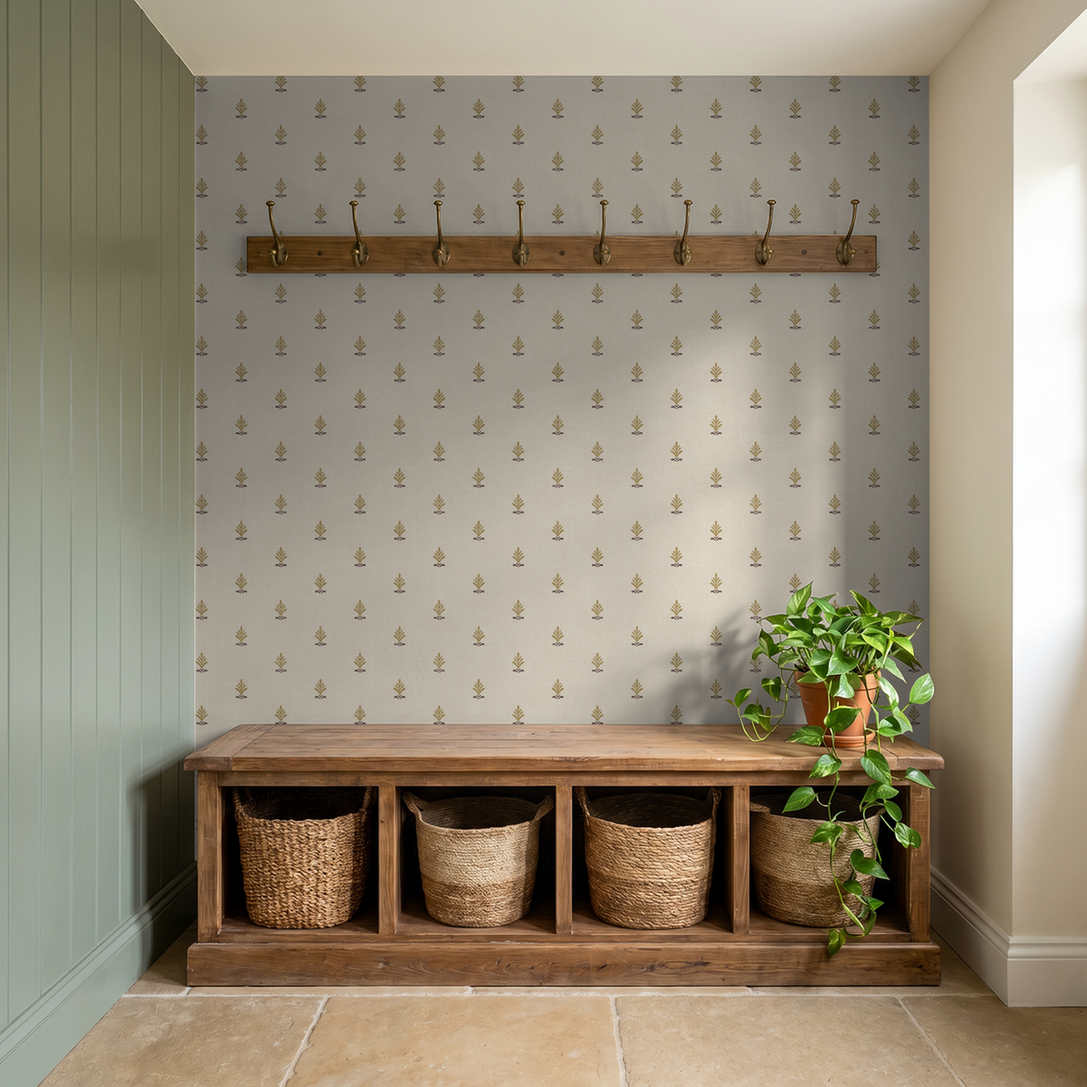Elegant gold motif wallpaper in rustic entryway with wooden bench and baskets.