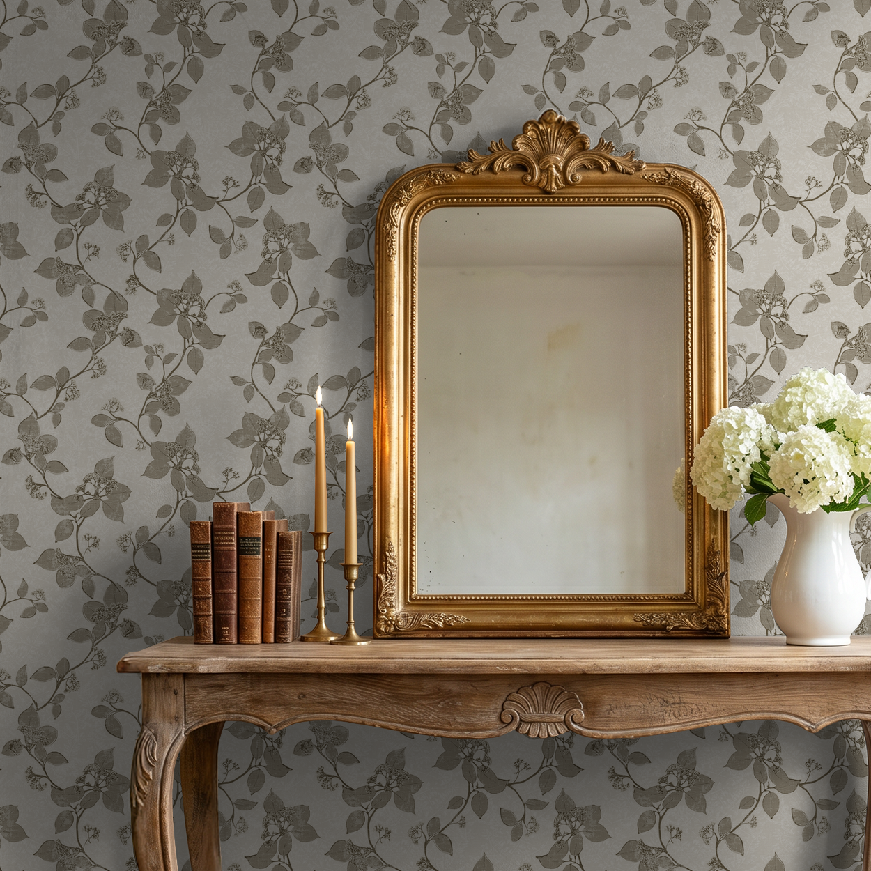 Elegant floral vine wallpaper in sepia tones with vintage mirror and wooden table decor.