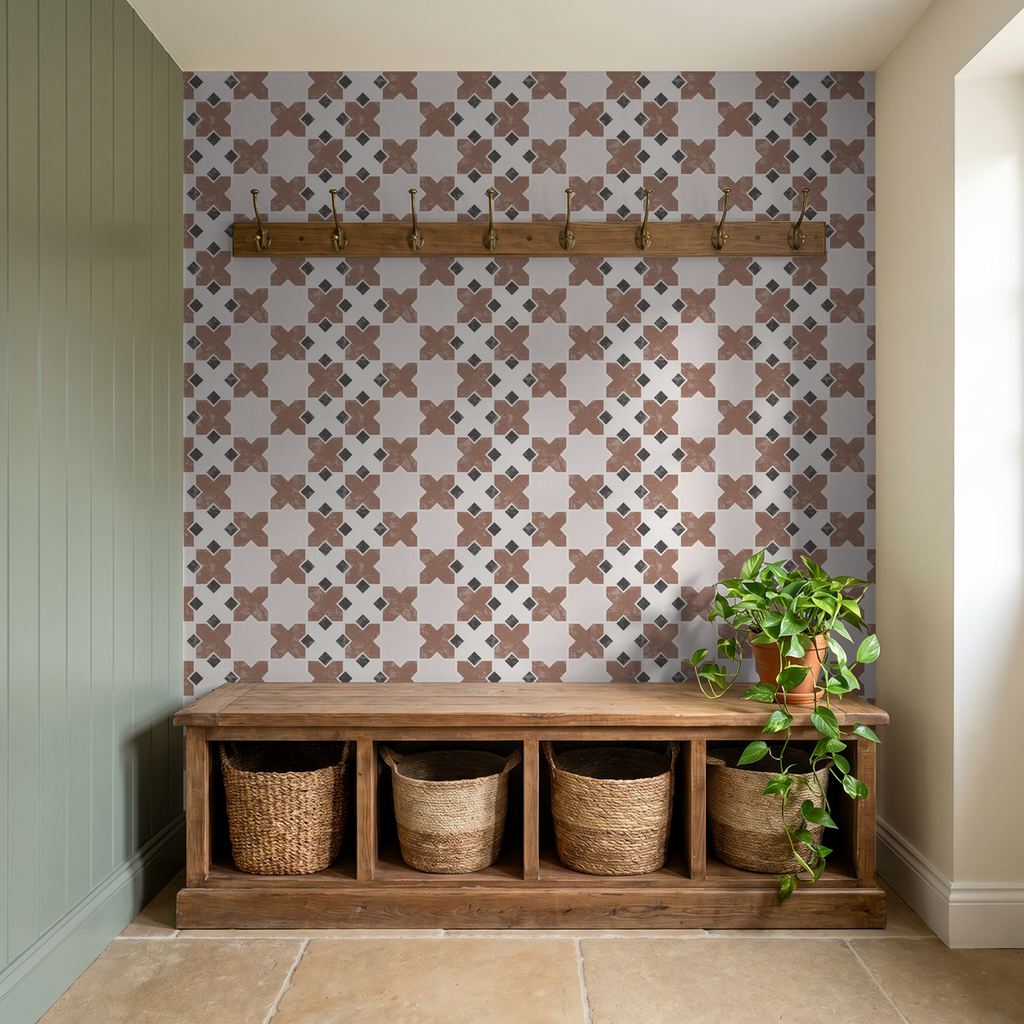 Geometric tile burnt orange wallpaper in rustic entryway with bench and plants.