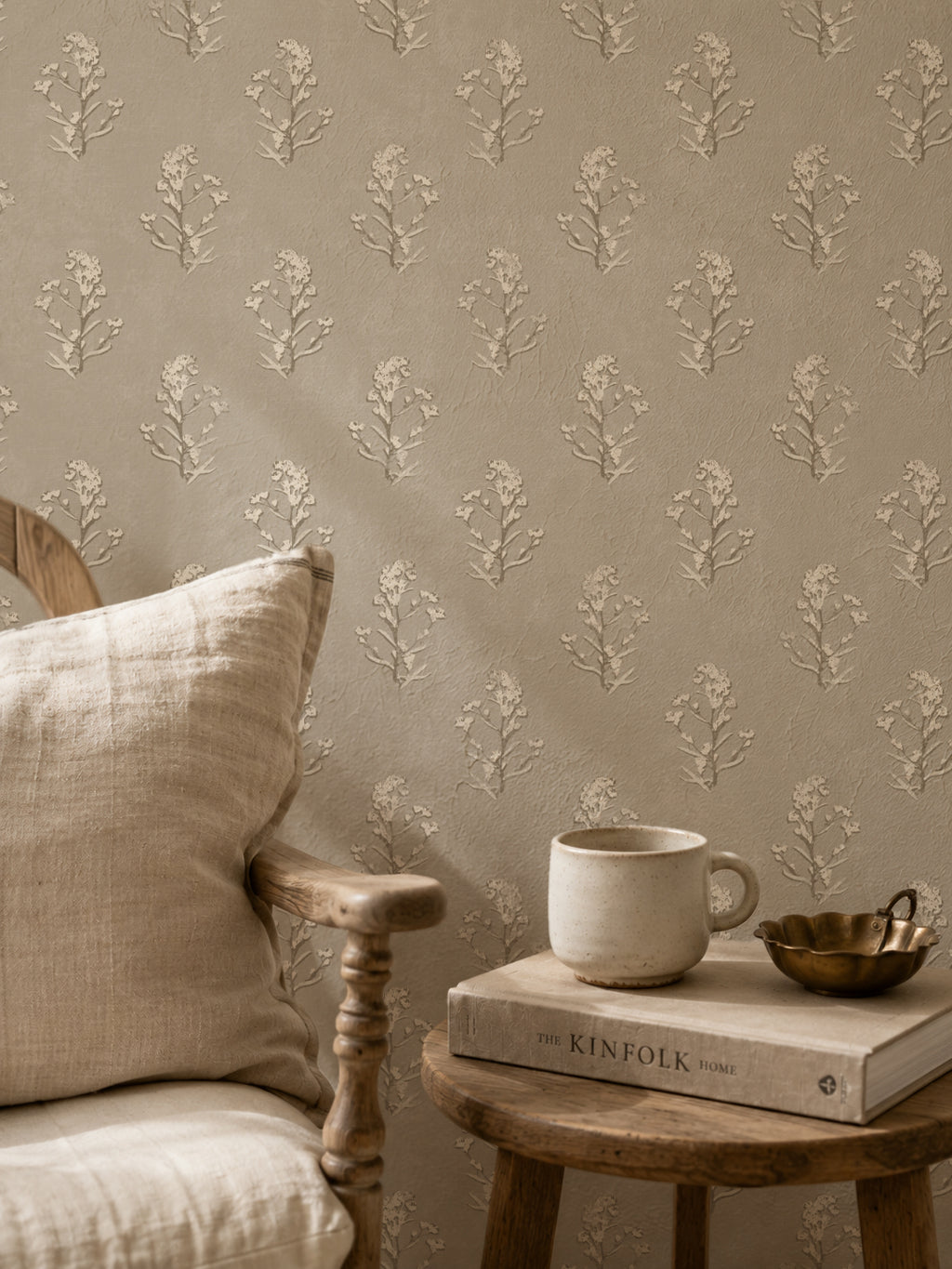 Heritage bloom linen wallpaper with floral pattern in cozy room setting.
