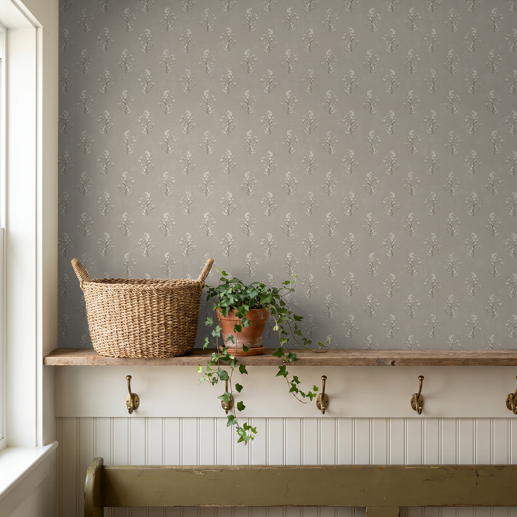 Heritage Bloom Linen wallpaper with floral pattern in rustic room with plants.