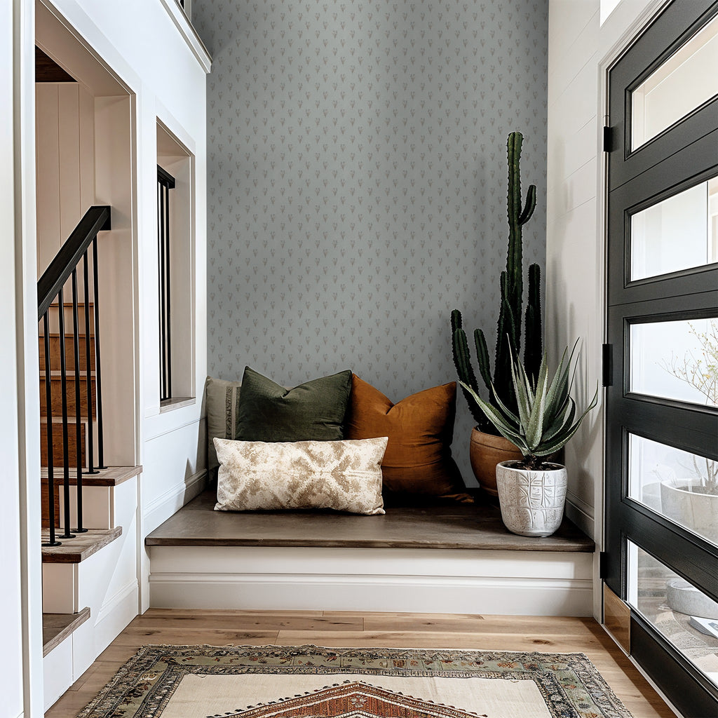 Lila Wildflower Bouquet French Blue wallpaper in cozy nook with cushions and plants.