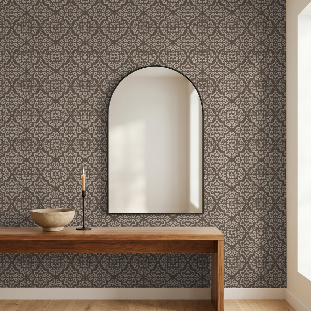 Mocha ornamental damask wallpaper in elegant room with mirror and wooden console.
