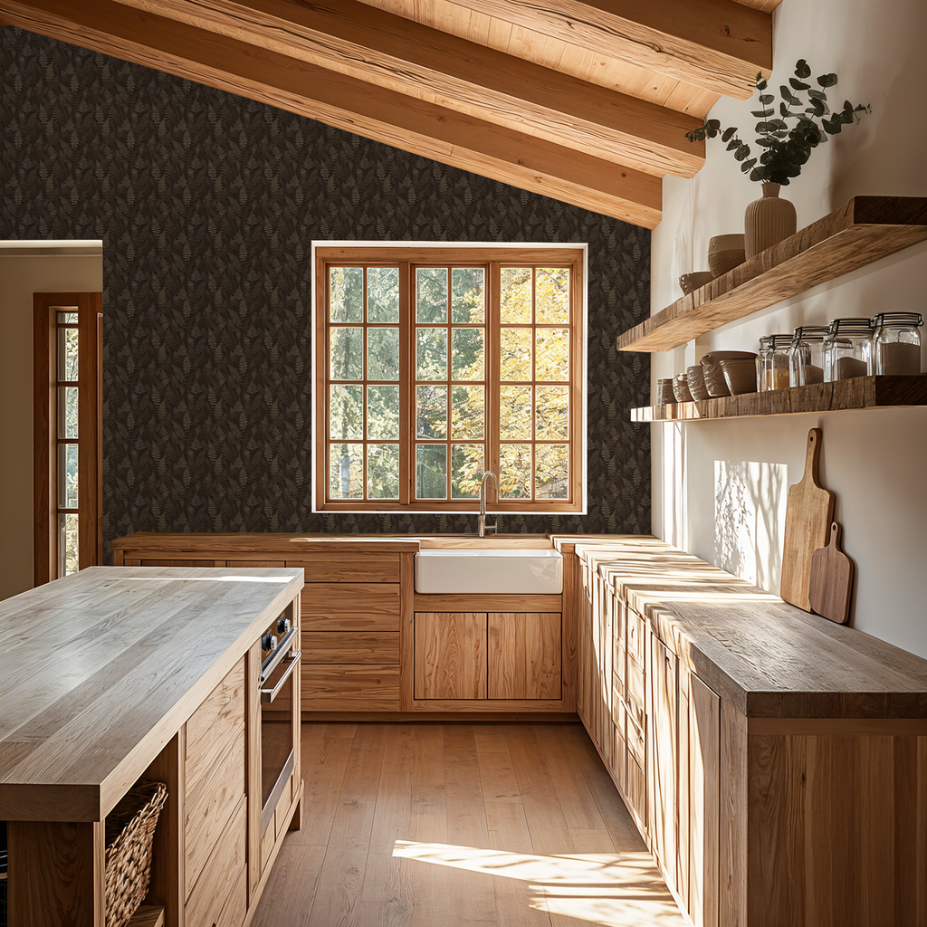 Moody espresso fern wallpaper in rustic kitchen with wooden cabinets and beams.