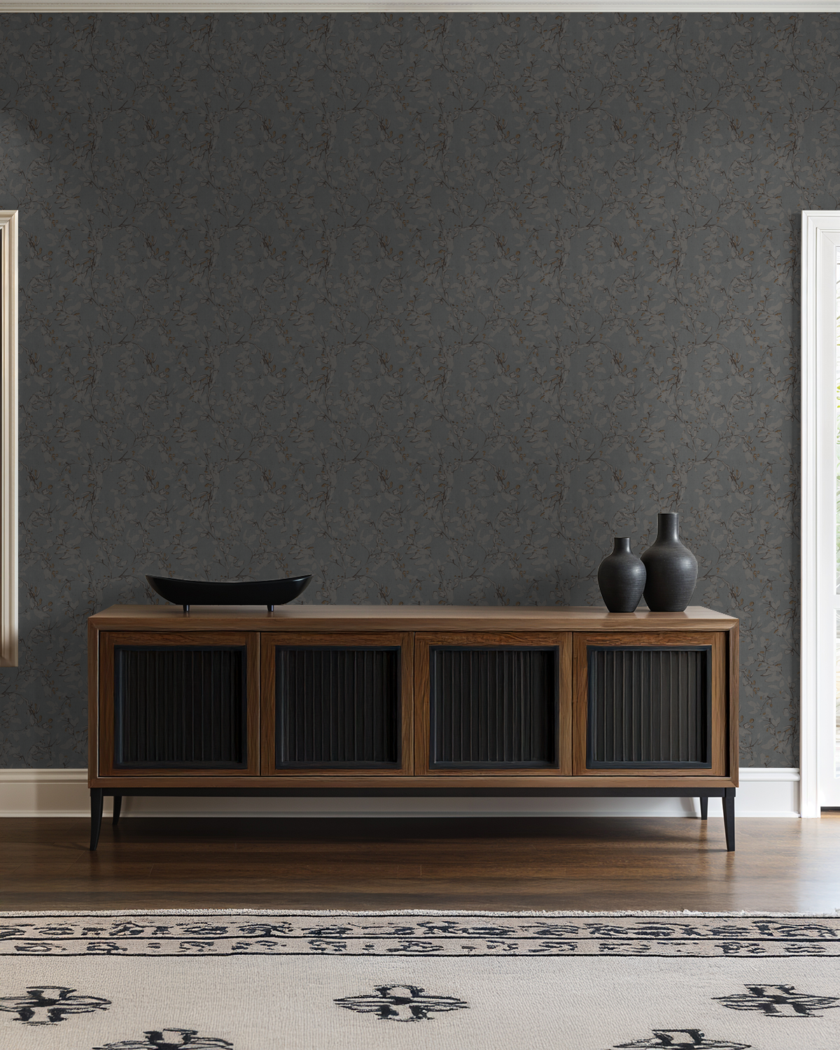 Navy floral vine wallpaper in elegant living room with wooden sideboard.