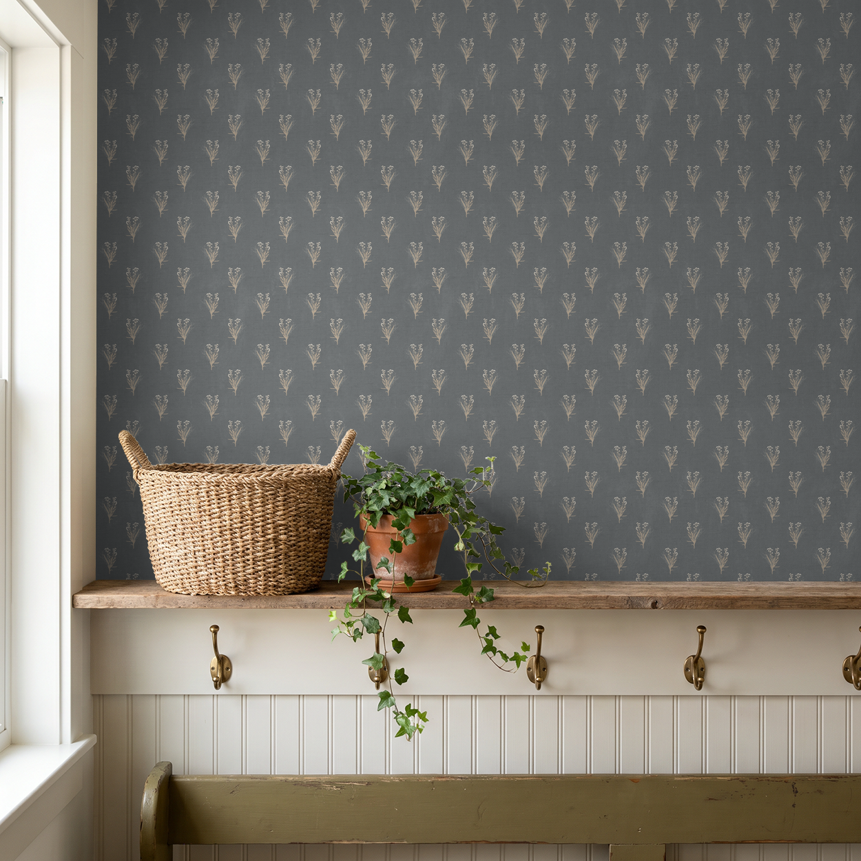 Navy floral wallpaper with wildflower pattern in rustic room setting.