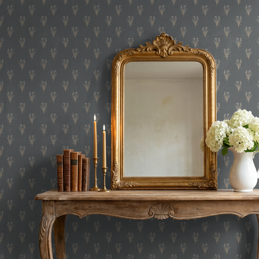 Navy floral wallpaper with wildflower pattern in vintage room with mirror and flowers.