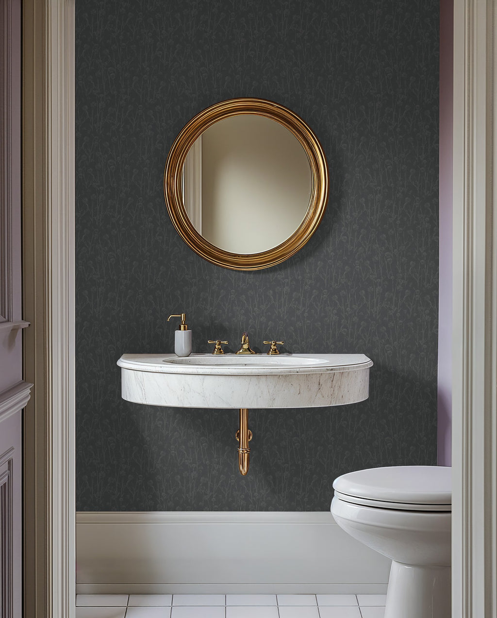Navy wildflower wallpaper in elegant bathroom with gold mirror and marble sink.
