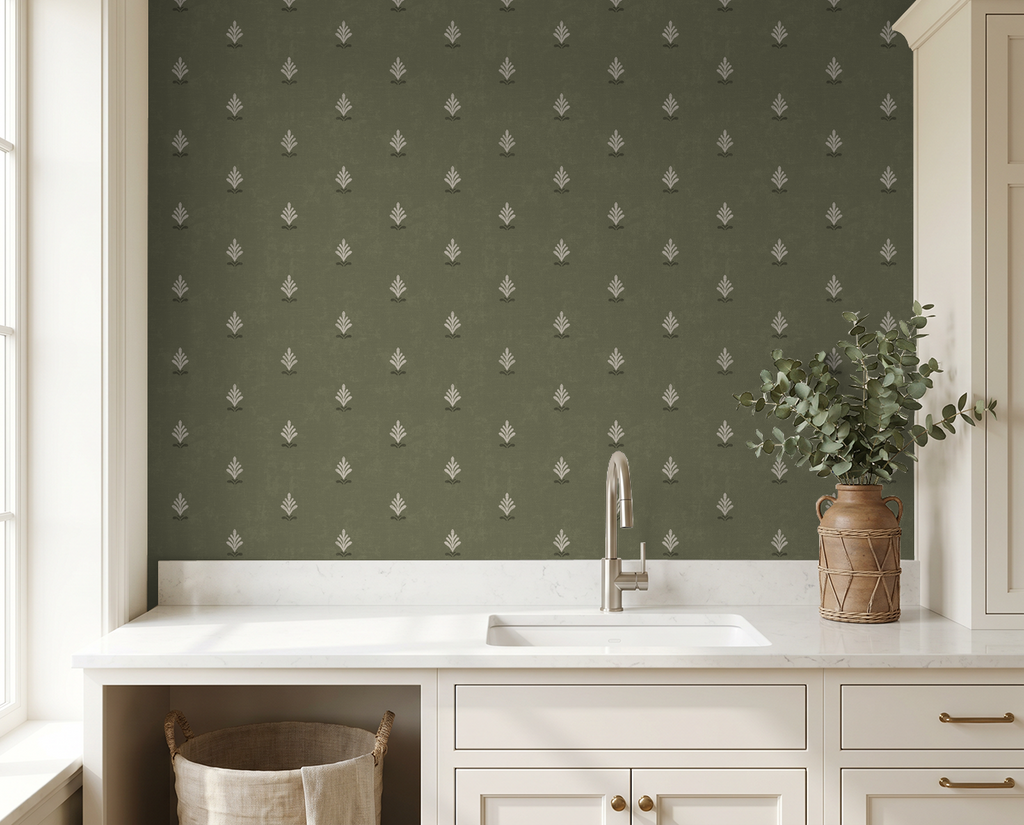Olive green wallpaper with cream motifs in a kitchen setting.