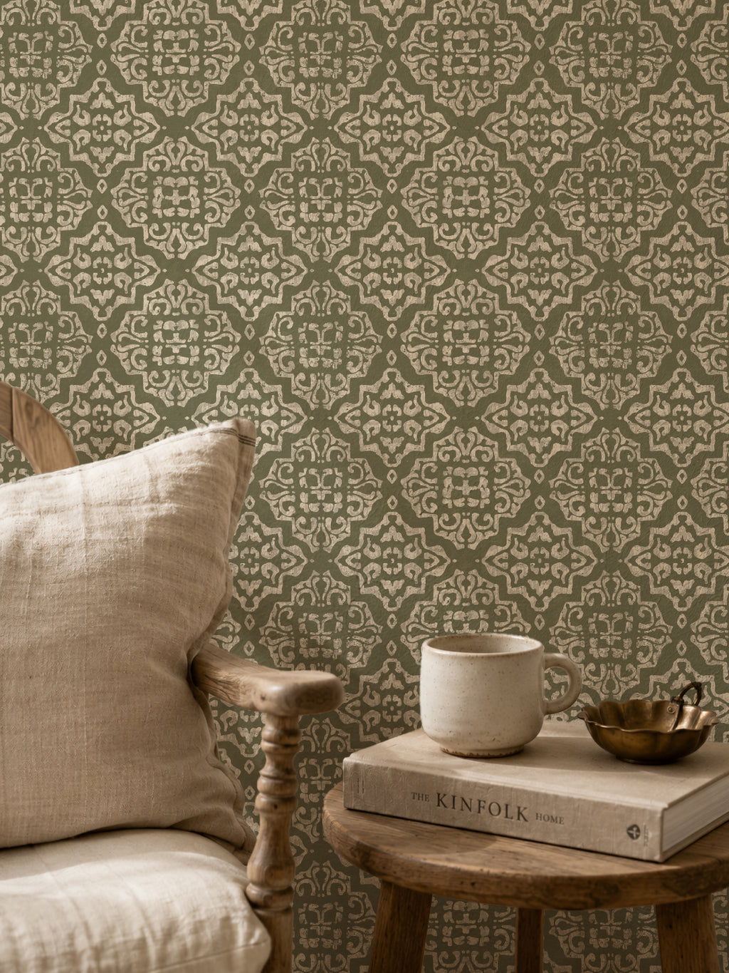 Ornate damask wallpaper in sage and cream with rustic decor setting.