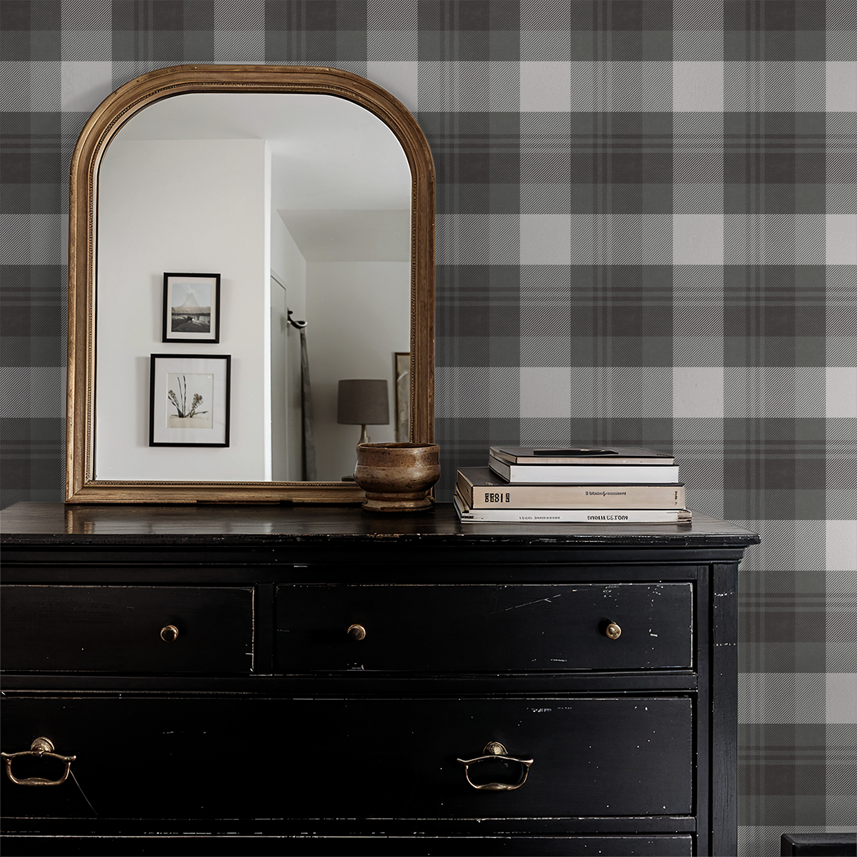 Plaid grey and charcoal wallpaper in a classic room with a vintage mirror and black dresser.