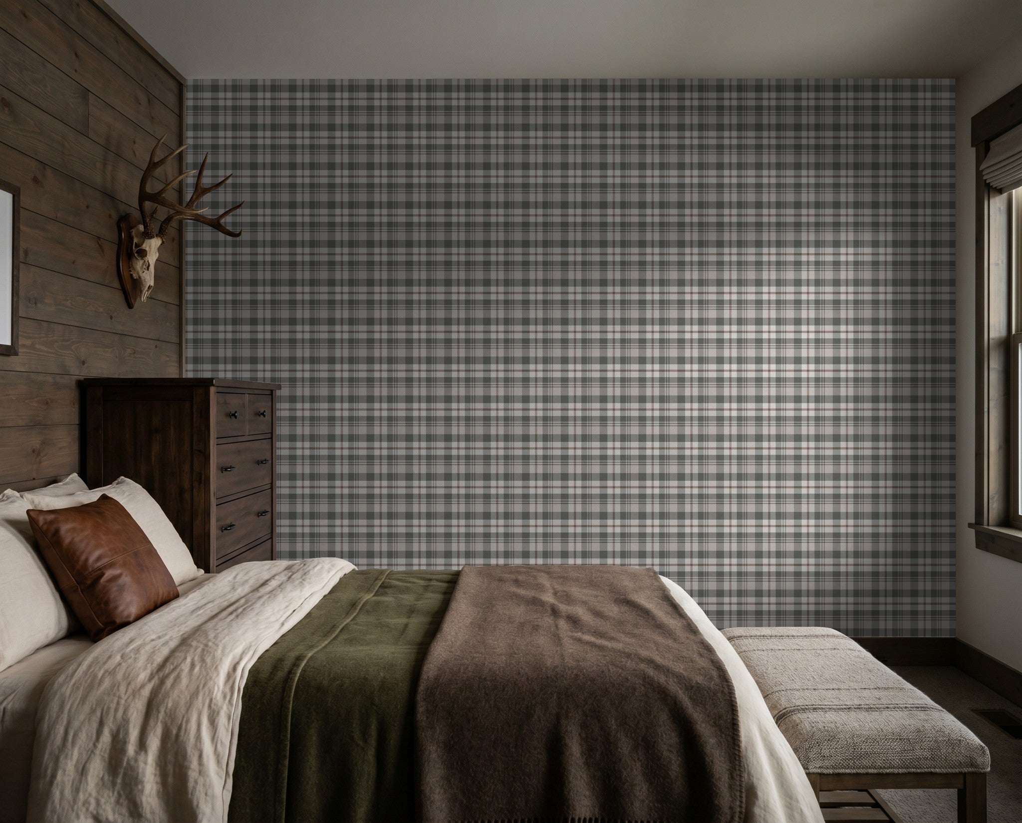Plaid wallpaper in cream and green in a rustic bedroom with wood accents.