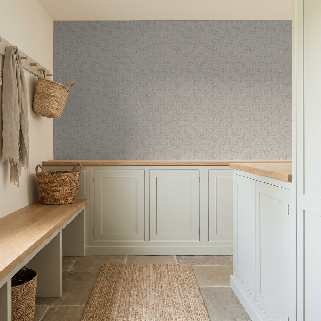Stone leaf pattern wallpaper in a modern neutral mudroom with wooden accents.