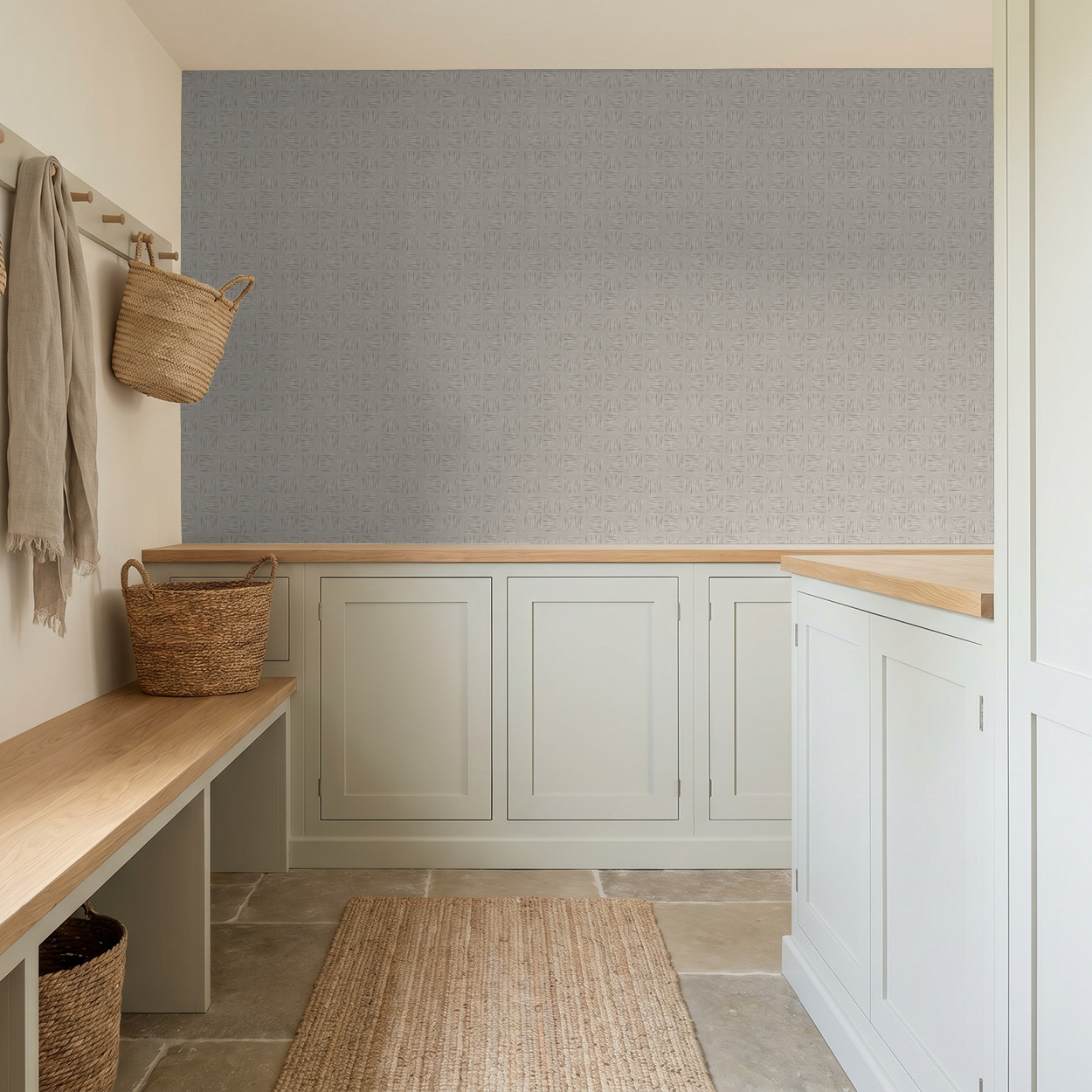 Stone leaf pattern wallpaper in a modern neutral mudroom with wooden accents.
