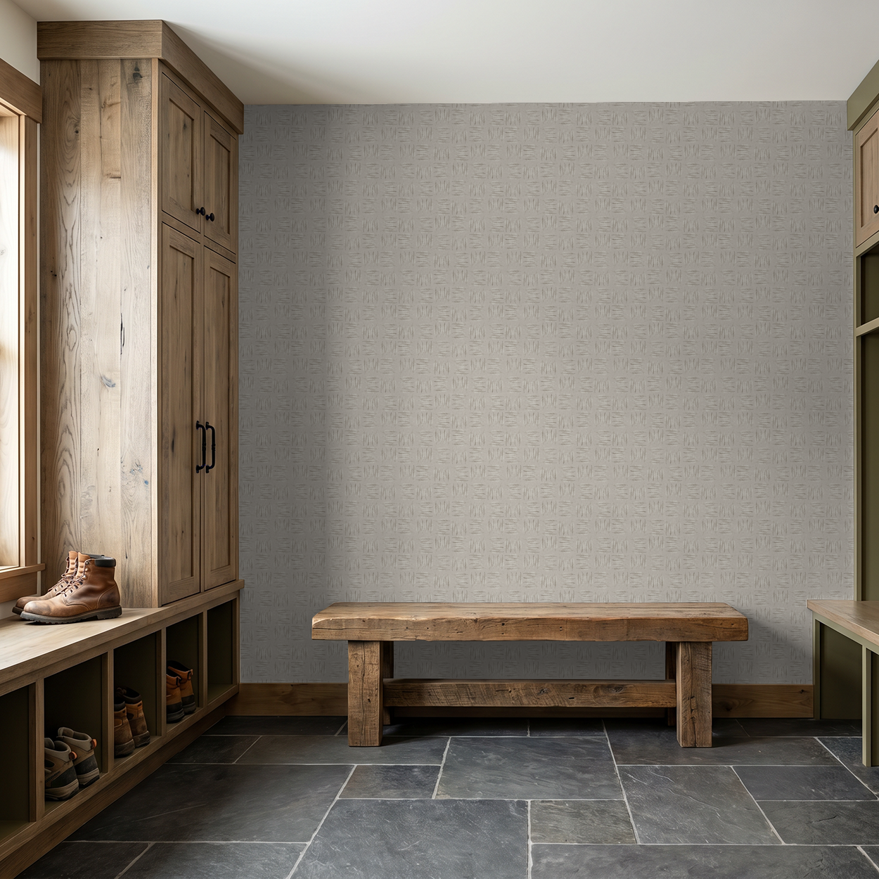 Stone leaf pattern wallpaper in rustic mudroom with wooden bench and cabinets.