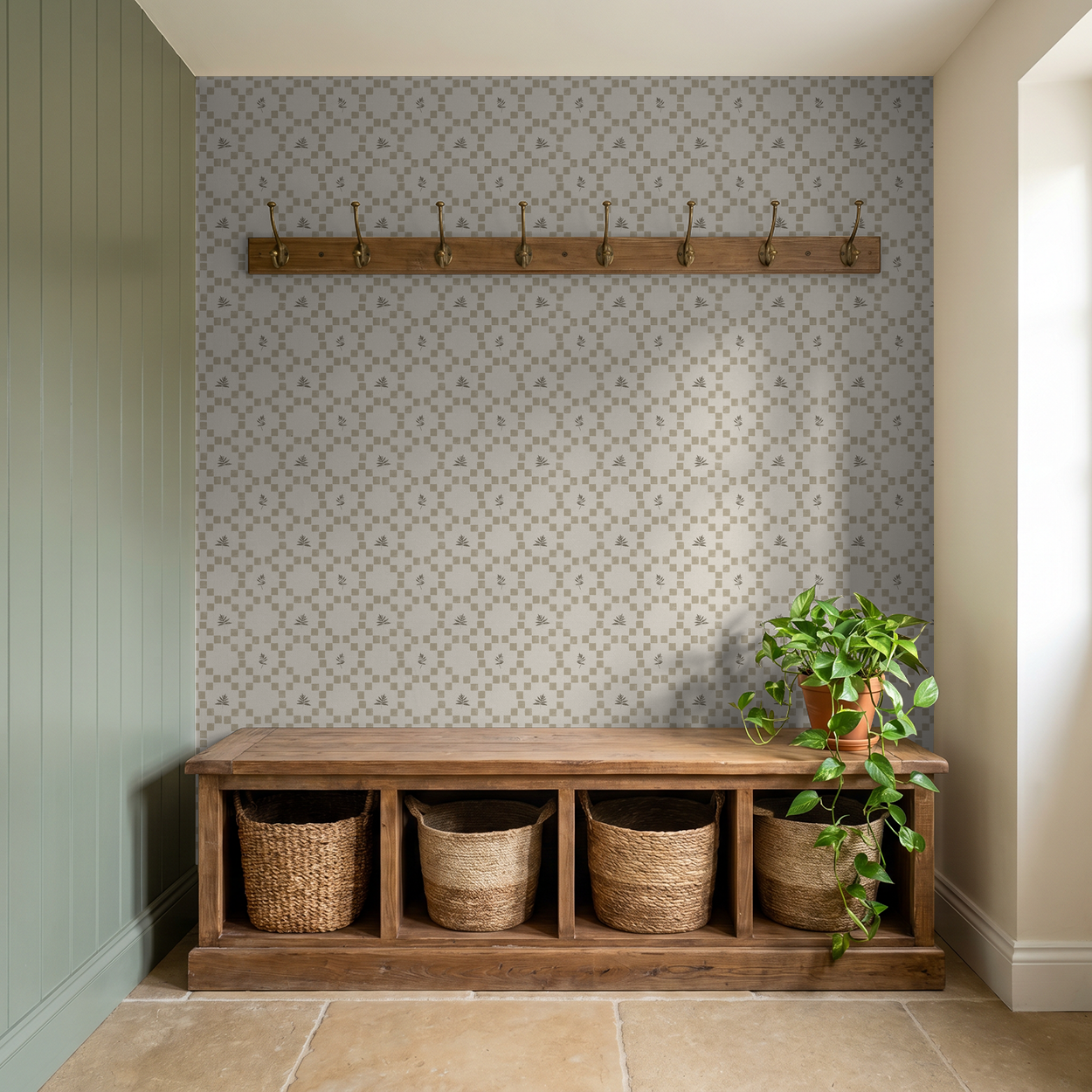 Taupe botanical lattice wallpaper in rustic entryway with wooden bench and plant.