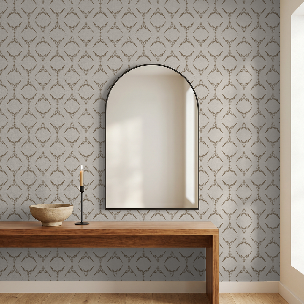 Taupe botanical medallion wallpaper in modern room with mirror and wooden table.