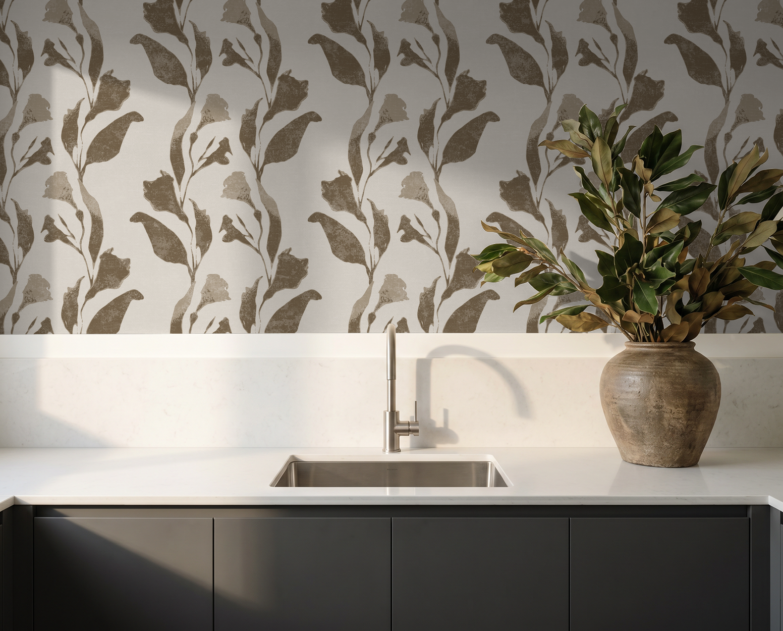 Taupe botanical vine wallpaper in modern kitchen with vase and sink.