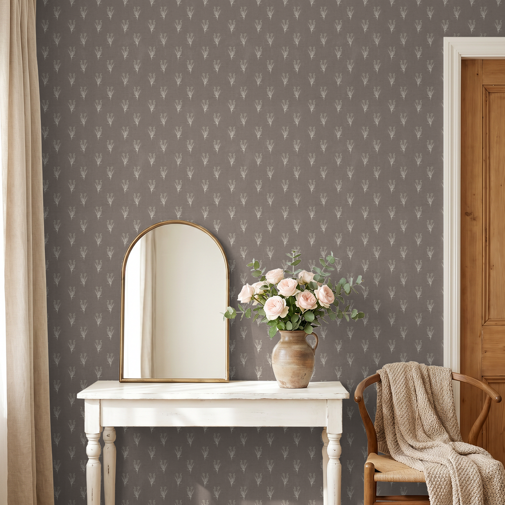Taupe wallpaper with ivory botanical motifs in elegant room setting.