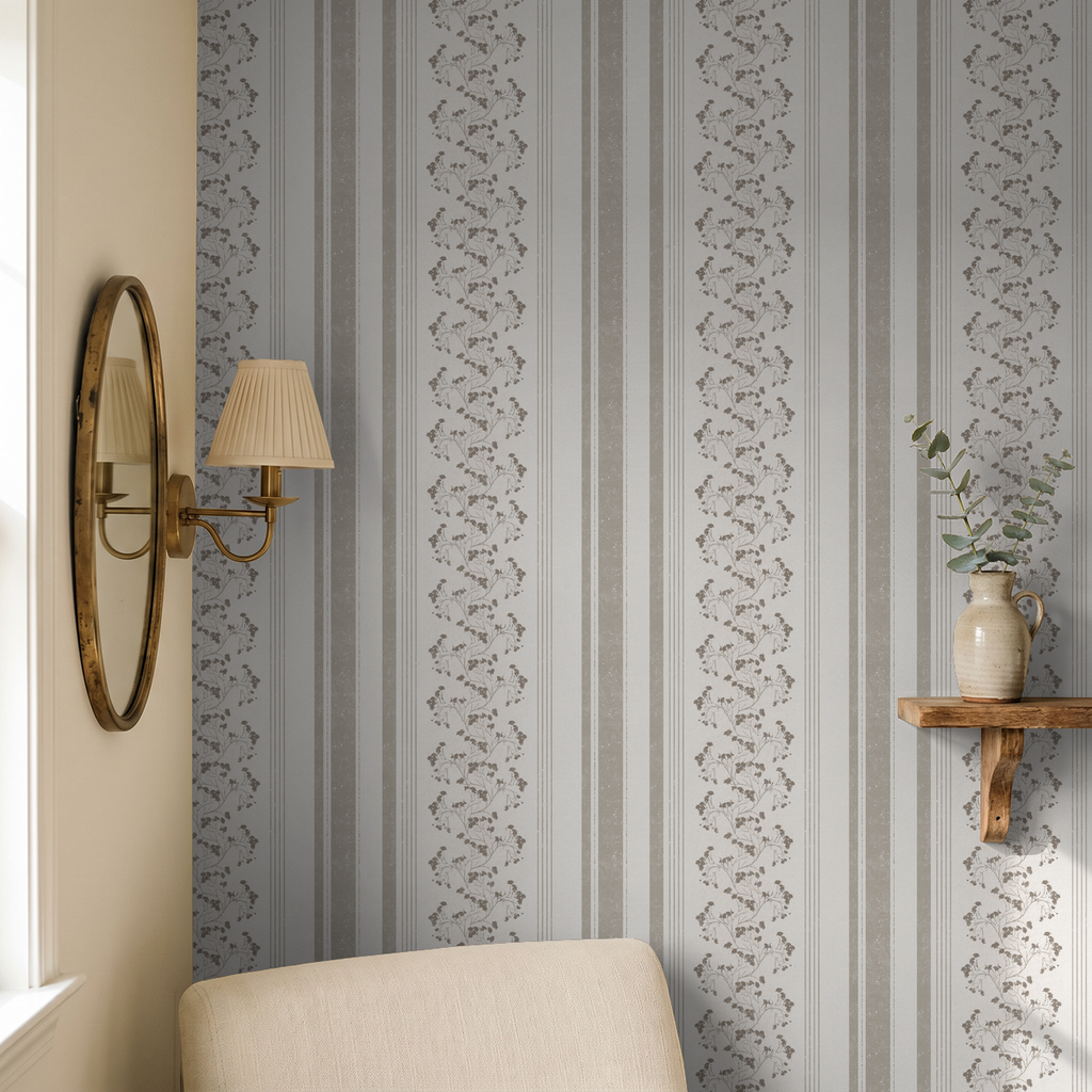 Taupe floral stripe wallpaper in elegant living room with mirror and shelf.