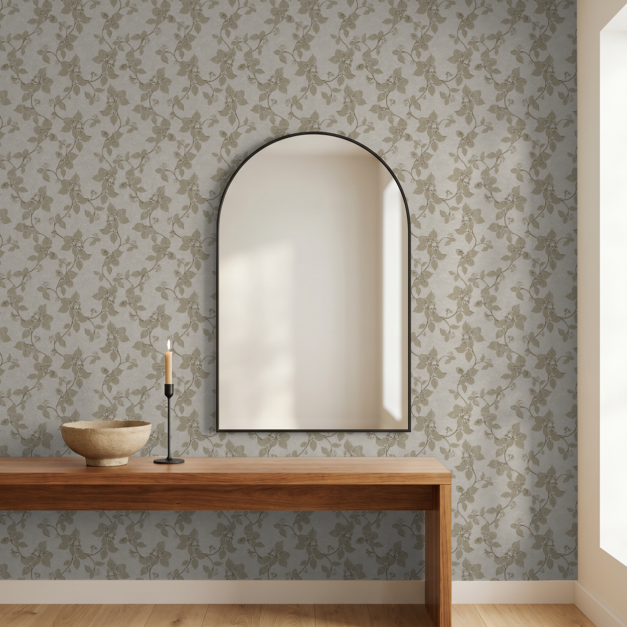 Taupe floral vine wallpaper in elegant room with mirror and wooden table.
