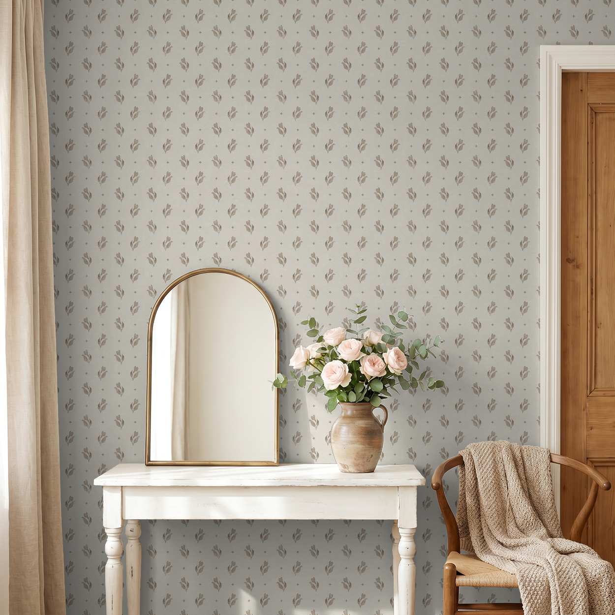 Taupe floral wallpaper in elegant room with mirror and flowers.